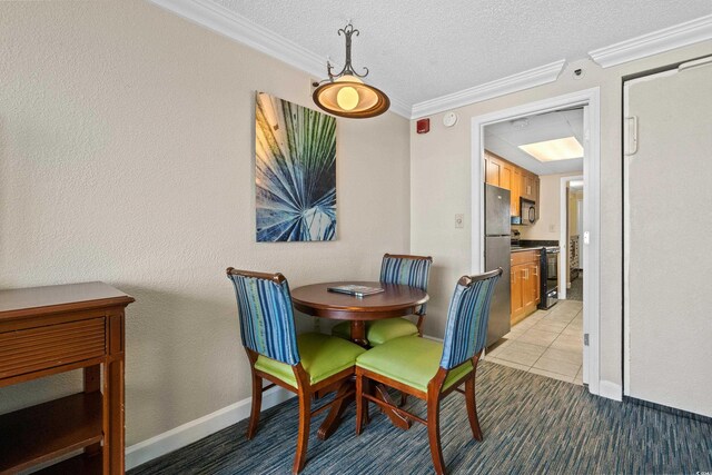 1200 N Ocean Blvd Unit 710, Myrtle Beach, SC 29577 - dining room featuring crown molding, a textured ceiling, and baseboards