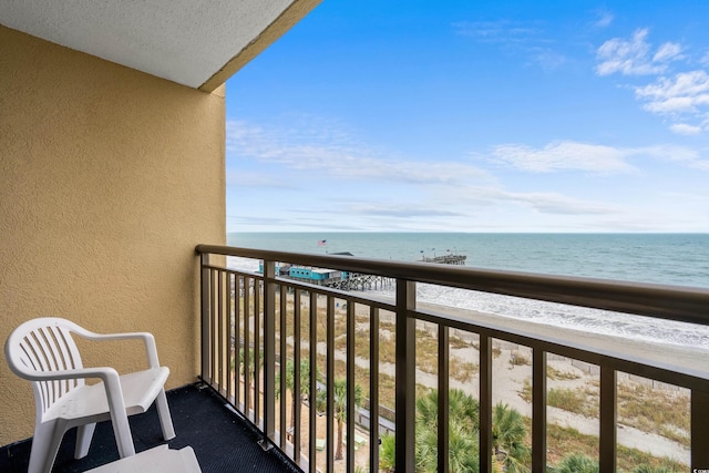 1200 N Ocean Blvd Unit 710, Myrtle Beach, SC 29577 - balcony with a water view and a view of the beach