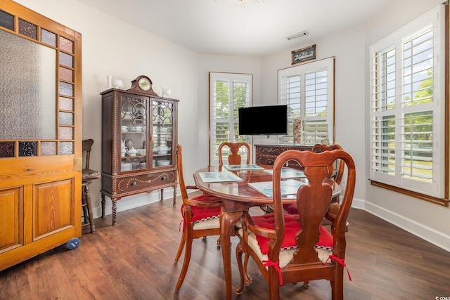 221 Lander Dr, Conway, SC 29526 - dining area featuring dark wood finished floors and baseboards