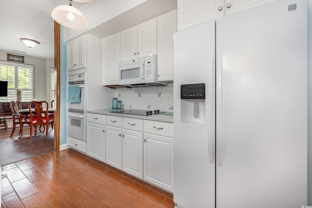 221 Lander Dr, Conway, SC 29526 - kitchen with white appliances, white cabinets, light wood-style floors, and decorative backsplash