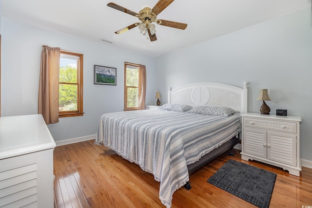 221 Lander Dr, Conway, SC 29526 - bedroom with light wood-style flooring, baseboards, and a ceiling fan
