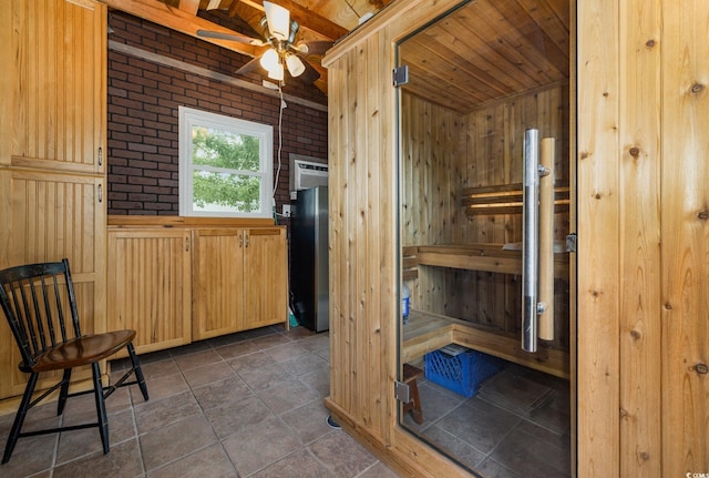 221 Lander Dr, Conway, SC 29526 - relaxing sauna / steam room featuring wood walls, wooden ceiling, brick wall, and stone finish flooring