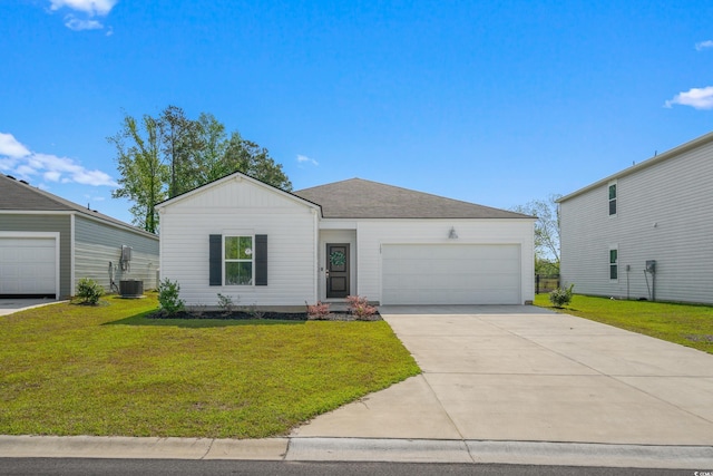 109 River Vista Way, Myrtle Beach, SC 29588 - view of front of home with a front lawn, central air condition unit, an attached garage, and driveway