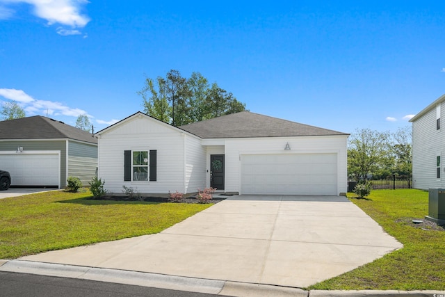 109 River Vista Way, Myrtle Beach, SC 29588 - view of front of home featuring a front lawn, a garage, and concrete driveway