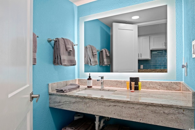 7200 Ocean Blvd N Unit 664, Myrtle Beach, SC 29572 - bathroom with a sink and a textured wall