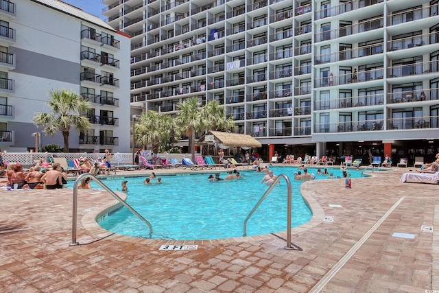 7200 Ocean Blvd N Unit 664, Myrtle Beach, SC 29572 - community pool with a patio