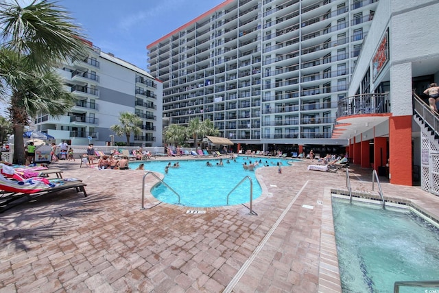 7200 Ocean Blvd N Unit 664, Myrtle Beach, SC 29572 - community pool with a patio