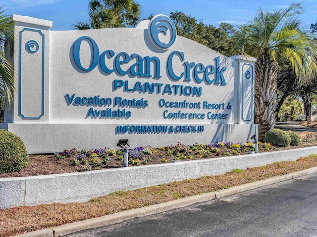 view of community sign