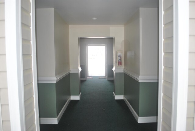 22 Woodhaven Dr Unit C, Murrells Inlet, SC 29576 - corridor with baseboards and dark colored carpet