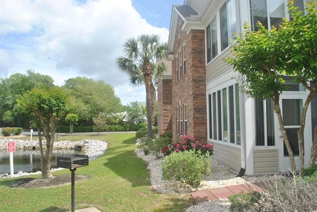 22 Woodhaven Dr Unit C, Murrells Inlet, SC 29576 - view of green lawn featuring a water view