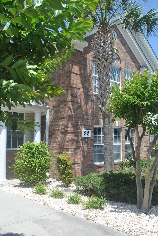 22 Woodhaven Dr Unit C, Murrells Inlet, SC 29576 - view of side of home featuring brick siding
