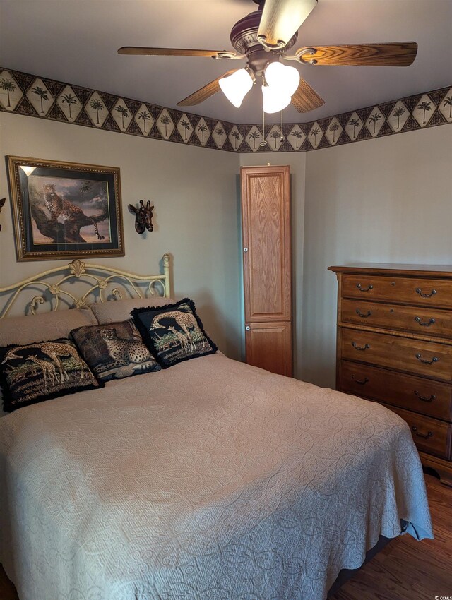 22 Woodhaven Dr Unit C, Murrells Inlet, SC 29576 - bedroom featuring ceiling fan and wood finished floors