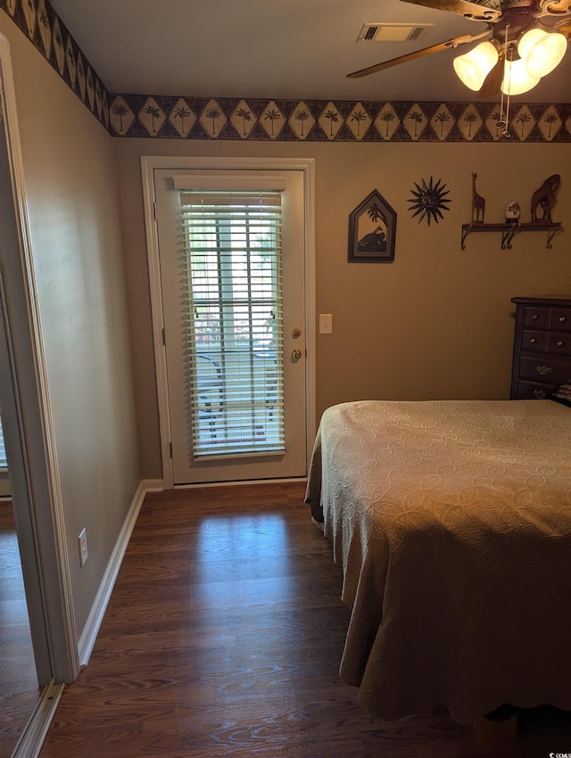 22 Woodhaven Dr Unit C, Murrells Inlet, SC 29576 - bedroom featuring access to exterior, a ceiling fan, baseboards, wood finished floors, and visible vents