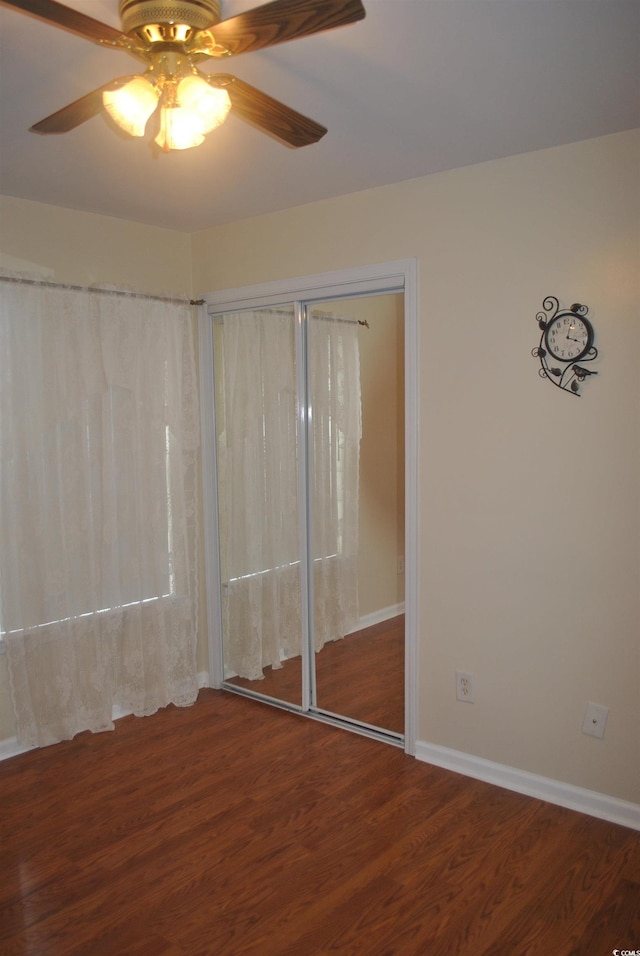 22 Woodhaven Dr Unit C, Murrells Inlet, SC 29576 - unfurnished bedroom featuring wood finished floors, ceiling fan, and baseboards