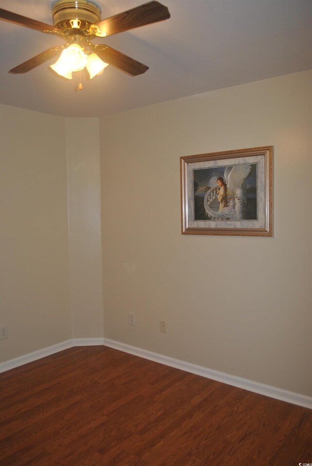 22 Woodhaven Dr Unit C, Murrells Inlet, SC 29576 - empty room with wood finished floors, a ceiling fan, and baseboards