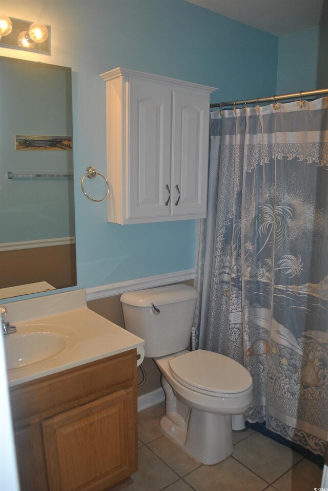 22 Woodhaven Dr Unit C, Murrells Inlet, SC 29576 - bathroom featuring tile patterned floors, toilet, vanity, and curtained shower
