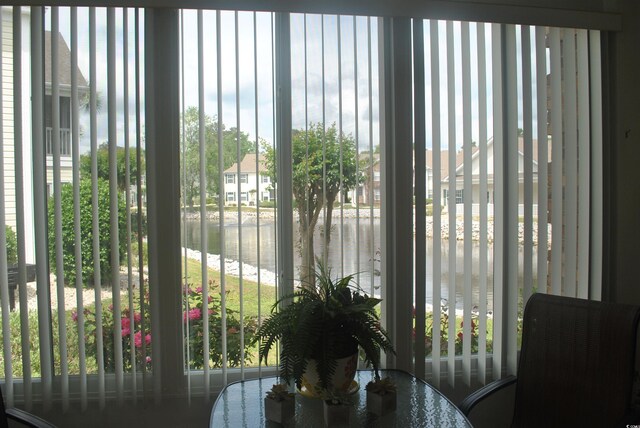 22 Woodhaven Dr Unit C, Murrells Inlet, SC 29576 - interior space featuring a water view and plenty of natural light