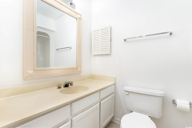 full bath featuring toilet and vanity