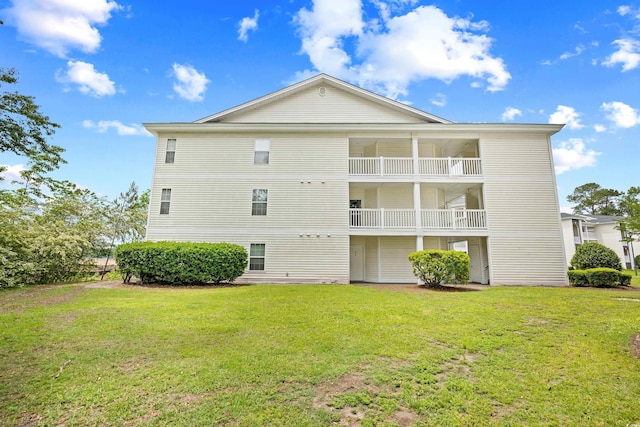 1204 River Oak Dr Unit 25-A, Myrtle Beach, SC 29579 - rear view of property featuring a lawn