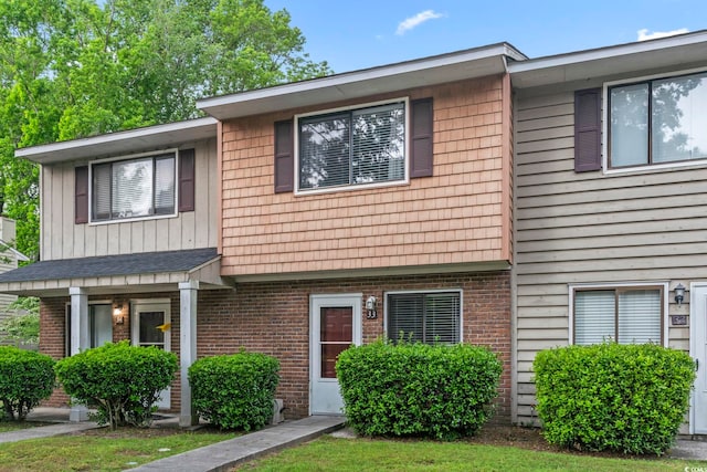 multi unit property featuring brick siding