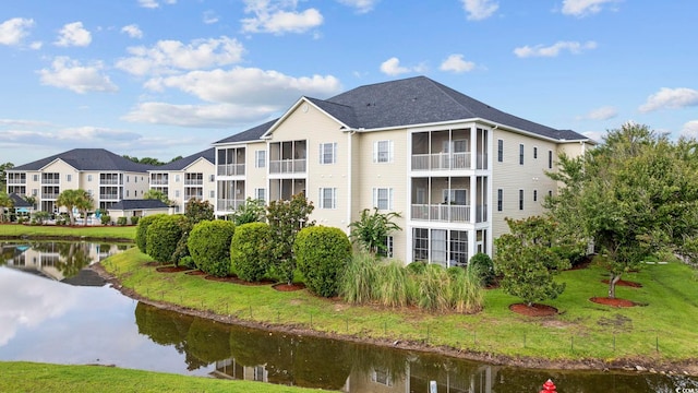 2090 Cross Gate Blvd Unit 202, Surfside Beach, SC 29575 - view of building exterior featuring a water view