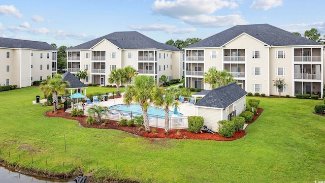 2090 Cross Gate Blvd Unit 202, Surfside Beach, SC 29575 - view of property's community with a pool, a gazebo, a patio, and an outbuilding
