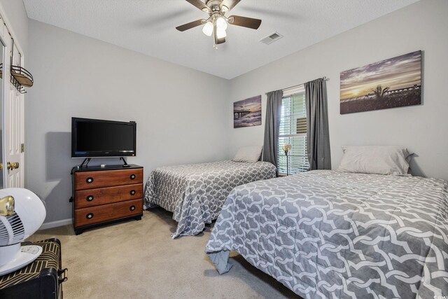 2090 Cross Gate Blvd Unit 202, Surfside Beach, SC 29575 - bedroom featuring carpet and a ceiling fan