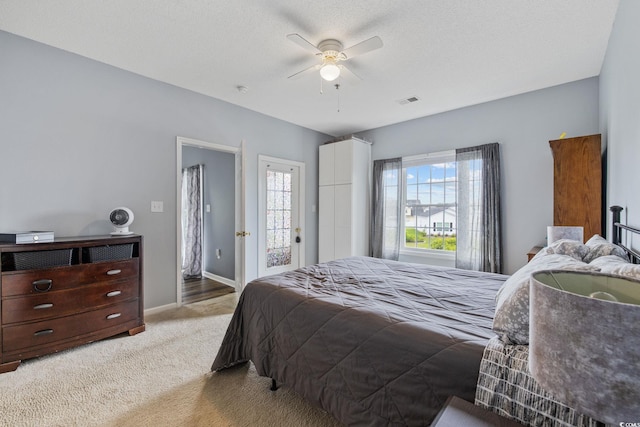 2090 Cross Gate Blvd Unit 202, Surfside Beach, SC 29575 - carpeted bedroom with baseboards and ceiling fan