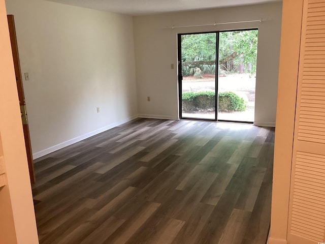 409 Salt Marsh Cir Unit 20C, Pawleys Island, SC 29585 - empty room featuring dark wood finished floors and baseboards
