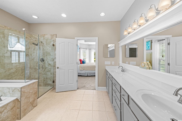 246 Laurel Bay Dr, Murrells Inlet, SC 29576 - ensuite bathroom with tile patterned flooring, a shower stall, a sink, and a garden tub