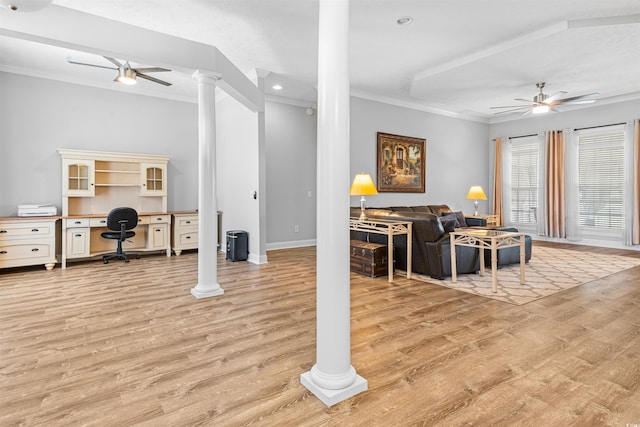 246 Laurel Bay Dr, Murrells Inlet, SC 29576 - living room with crown molding, ceiling fan, light wood-style floors, baseboards, and ornate columns