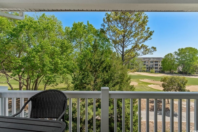 balcony with view of golf course