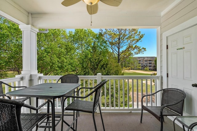 balcony featuring a ceiling fan