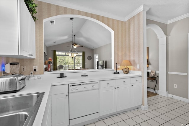 kitchen featuring arched walkways, ceiling fan, dishwasher, and white cabinets