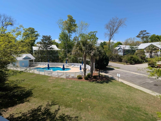 18 Trigger Fish Ln, Murrells Inlet, SC 29576 - view of pool featuring a lawn, fence, and a fenced in pool