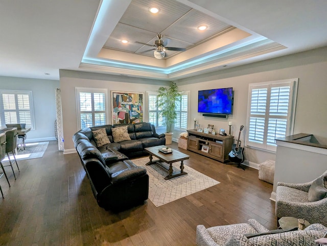 18 Trigger Fish Ln, Murrells Inlet, SC 29576 - living area featuring plenty of natural light, a ceiling fan, a raised ceiling, and baseboards
