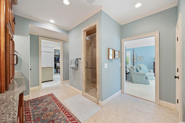 741 Tuckers Rd, Pawleys Island, SC 29585 - bathroom featuring crown molding, a shower stall, connected bathroom, recessed lighting, and a walk in closet