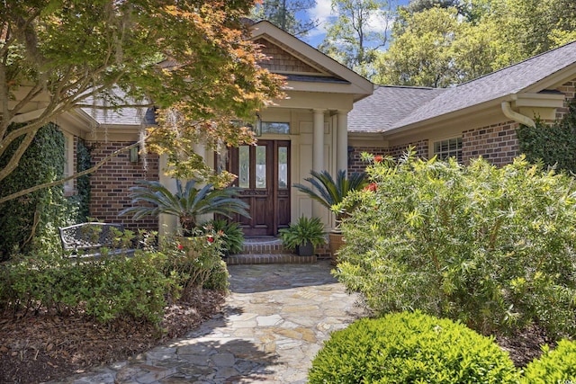 741 Tuckers Rd, Pawleys Island, SC 29585 - entrance to property featuring brick siding and roof with shingles