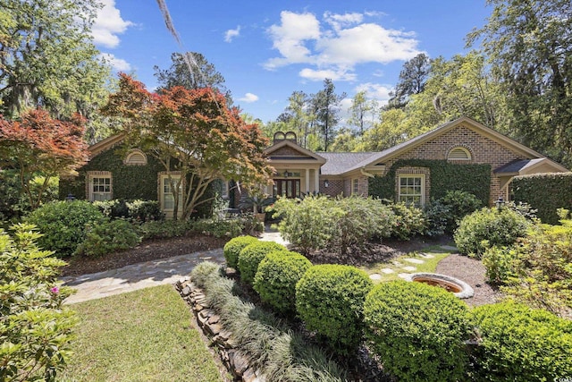 741 Tuckers Rd, Pawleys Island, SC 29585 - view of front facade featuring brick siding