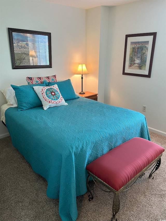 310 N 73rd Ave N Unit 5D, Myrtle Beach, SC 29572 - bedroom with carpet floors and baseboards