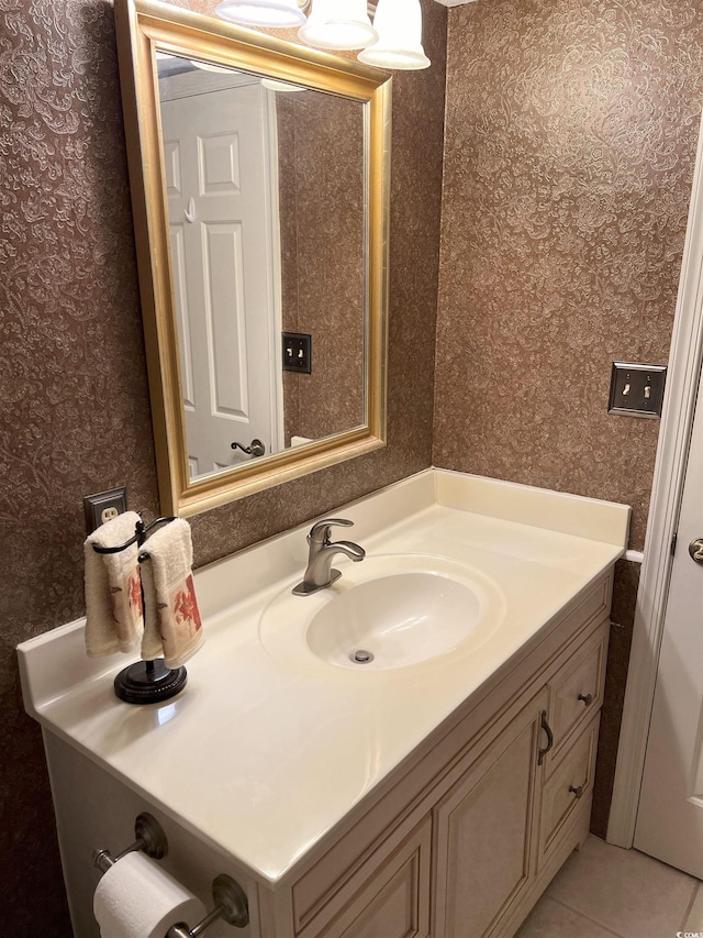 310 N 73rd Ave N Unit 5D, Myrtle Beach, SC 29572 - bathroom with wallpapered walls, vanity, and tile patterned flooring