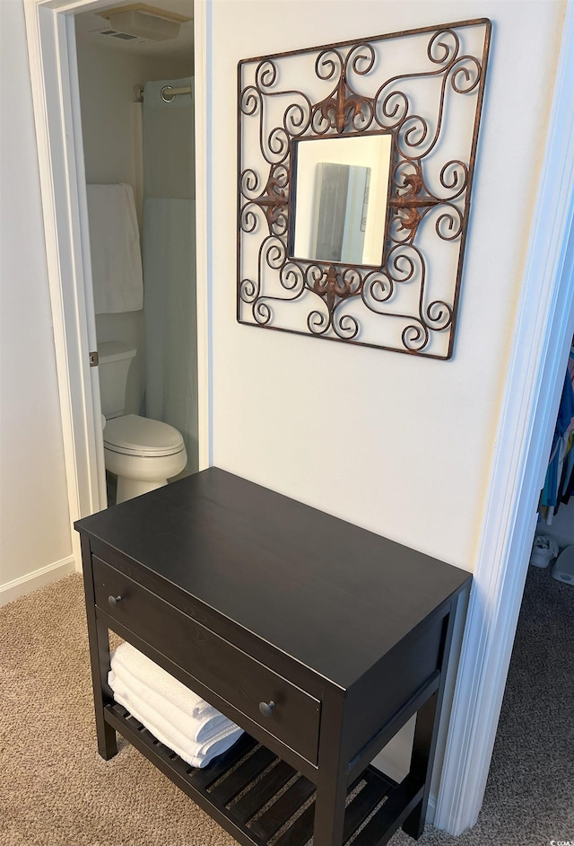 310 N 73rd Ave N Unit 5D, Myrtle Beach, SC 29572 - bathroom with toilet and baseboards