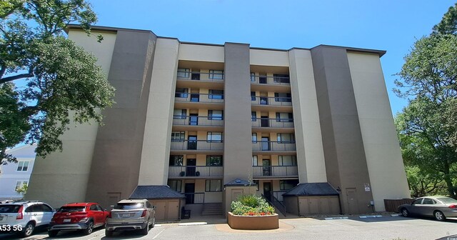 310 N 73rd Ave N Unit 5D, Myrtle Beach, SC 29572 - view of apartment building / complex featuring uncovered parking