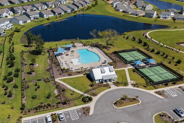 aerial view with a water view and a residential view