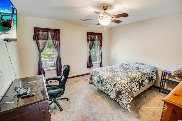 4391 Party Pines Rd, Conway, SC 29526 - carpeted bedroom with multiple windows, visible vents, baseboards, and a ceiling fan