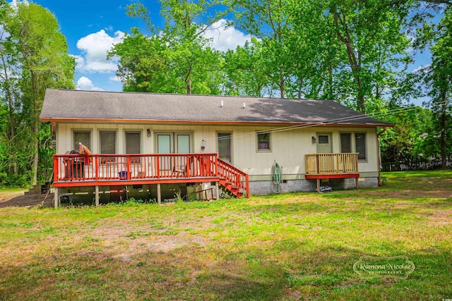 back of house featuring roof with shingles, a yard, crawl space, and a wooden deck