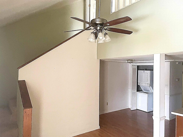 500 Fairway Village Dr Unit 6E, Myrtle Beach, SC 29588 - detailed view of stacked washer / dryer, a ceiling fan, and wood finished floors