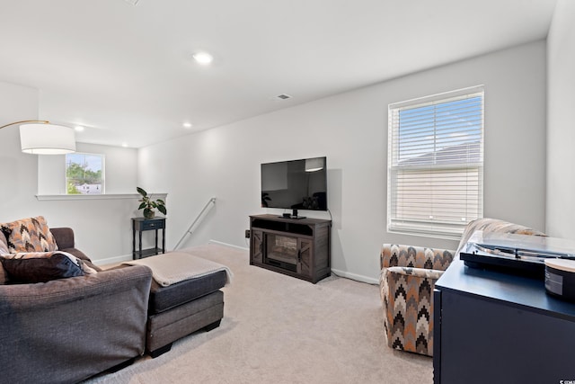 189 Timber Oaks Dr, Myrtle Beach, SC 29588 - living room featuring light colored carpet, recessed lighting, baseboards, and a fireplace