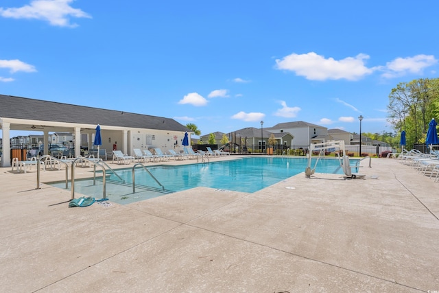 189 Timber Oaks Dr, Myrtle Beach, SC 29588 - community pool with a patio area and a residential view