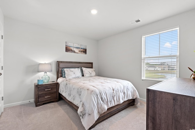 189 Timber Oaks Dr, Myrtle Beach, SC 29588 - bedroom with light carpet, baseboards, and multiple windows